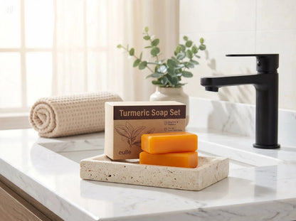 Unica Kojic Acid and Turmeric Soap Duo bar set with natural ingredients on a spa lifestyle background.